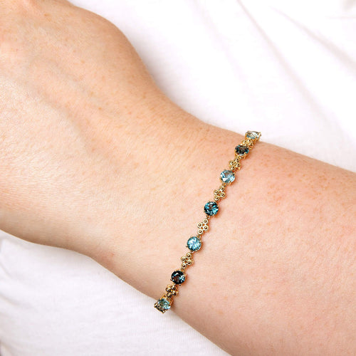 9ct Yellow Gold Ornate Blue Topaz Bracelet